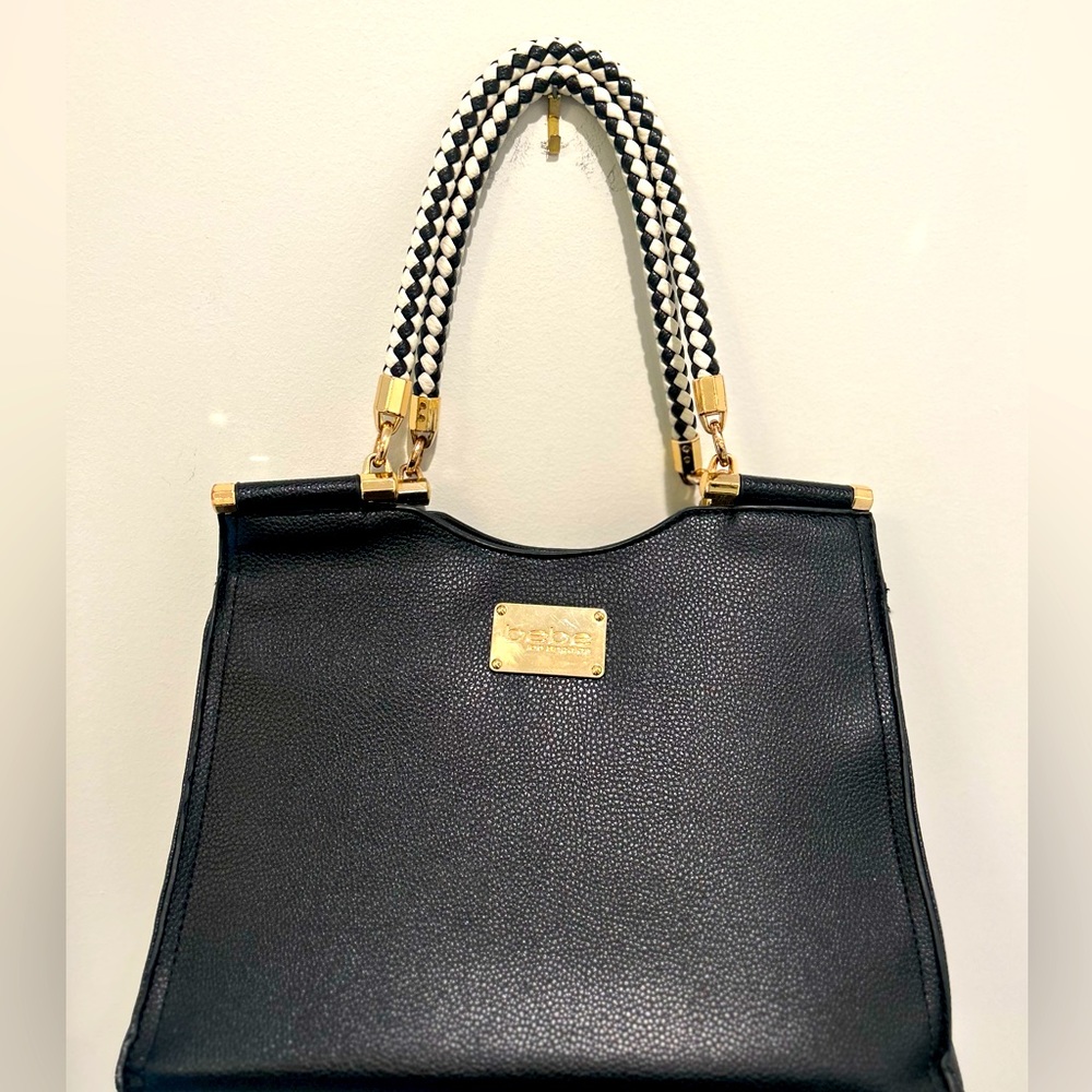 BEBE Faux Leather Purse with Trendy Black and White Straps